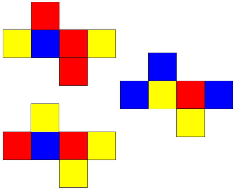 Desarrollo plano de tres dados con caras de colores